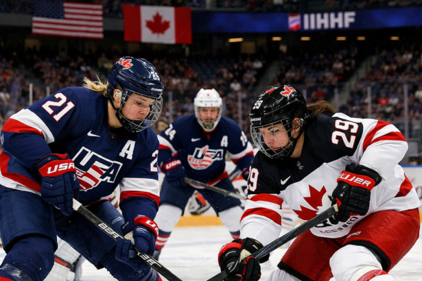 Marie-Philip Poulin celebrates her record-breaking goal during the 2026 Winter Olympics.